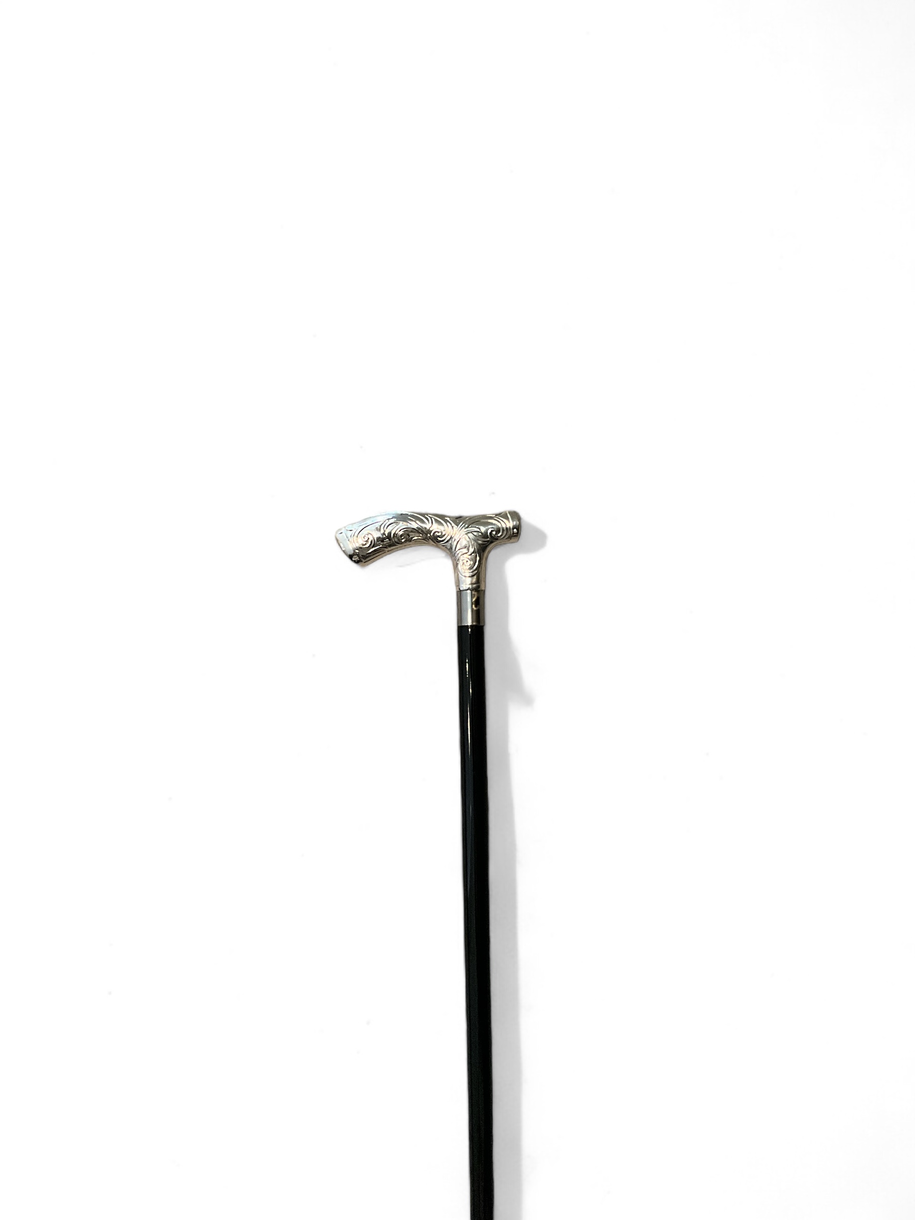 Bastone con dettagli floreali