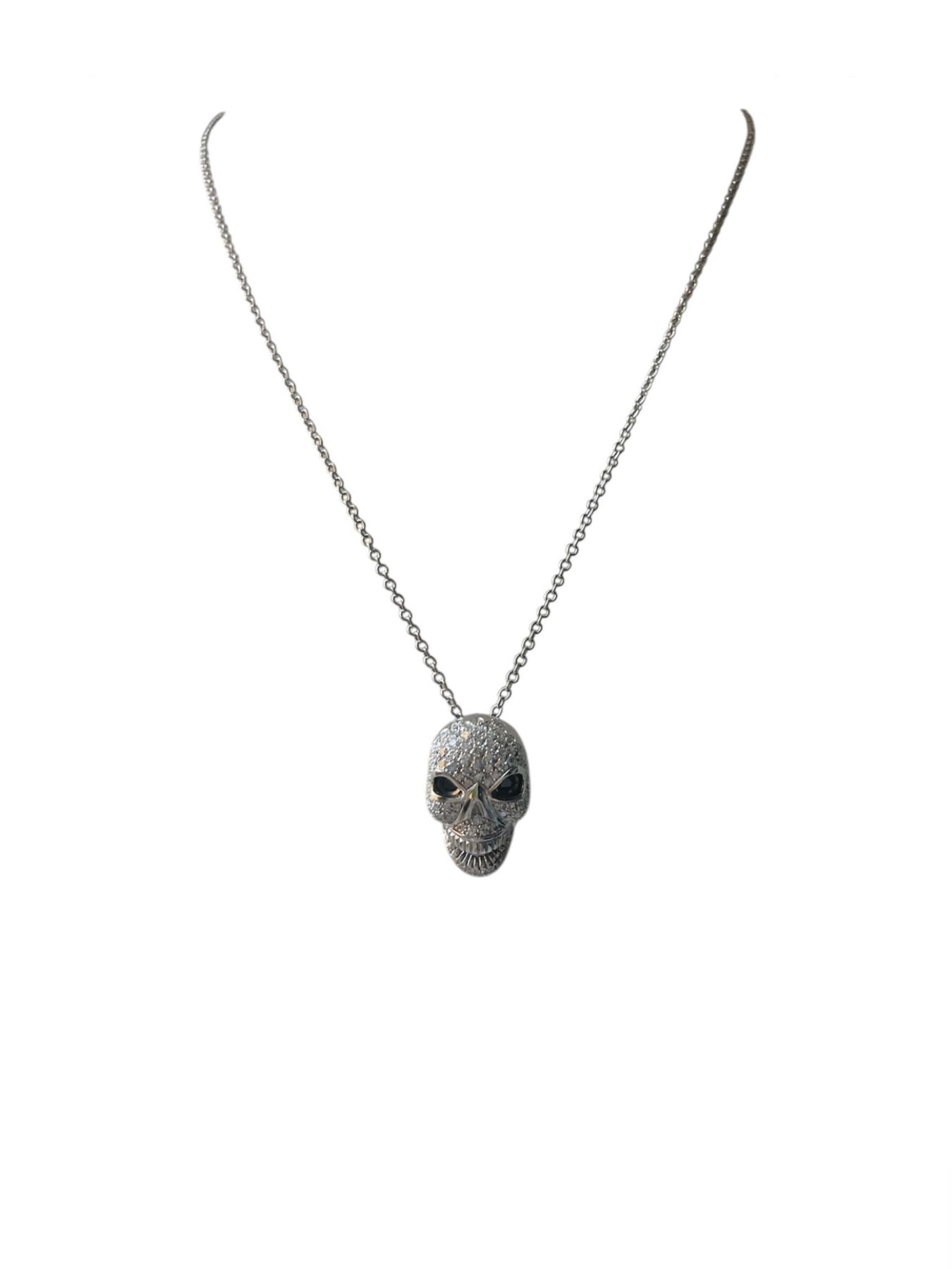 Collana in oro con ciondolo un teschio in diamanti